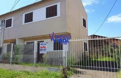 Imagem: A casa possui 2 Dormitórios, 2 Banheiros, 2 Vagas na garagem