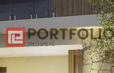 Imagem: A casa possui 4 Dormitórios, 5 Banheiros, 4 Vagas na garagem