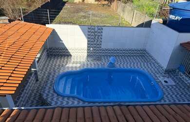 Imagem: A casa possui 4 Dormitórios, 3 Banheiros, 5 Vagas na garagem