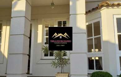 Imagem: A casa possui 3 Dormitórios, 5 Banheiros, 5 Vagas na garagem