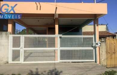 Imagem: A casa possui 3 Dormitórios, 1 Banheiro, 1 Vaga na garagem