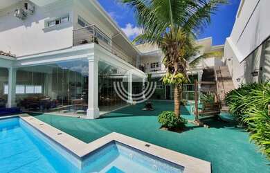 Imagem: A casa em condomínio possui 4 Dormitórios, 5 Banheiros, 4