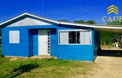 Imagem: A casa em condomínio possui 2 Dormitórios, 1 Banheiro, 2 Vagas