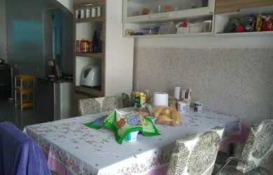 Imagem: A casa possui 3 Dormitórios, 2 Banheiros, 3 Vagas na garagem