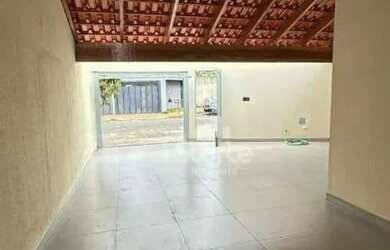 Imagem: A casa possui 3 Dormitórios, 2 Banheiros, 3 Vagas na garagem