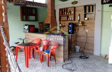 Imagem: A casa possui 3 Dormitórios, 3 Banheiros, 4 Vagas na garagem