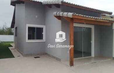 Imagem: A casa possui 2 Dormitórios, 1 Banheiro, 2 Vagas na garagem