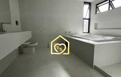 Imagem 14: Casa de condomínio para venda possui 370 metros quadrados com 4 Suítes