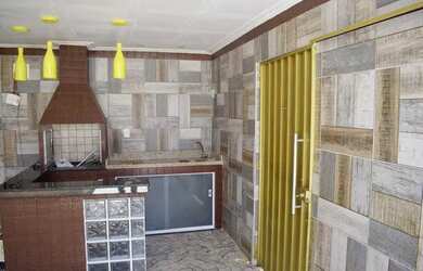 Imagem: A casa à venda possui 2 Dormitórios, 2 Banheiros, 1 Vaga na