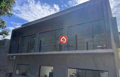 Imagem: A casa possui 3 Dormitórios, 3 Banheiros, 2 Vagas na garagem