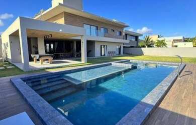 Imagem: A casa em condomínio possui 5 Dormitórios, 5 Banheiros, 4