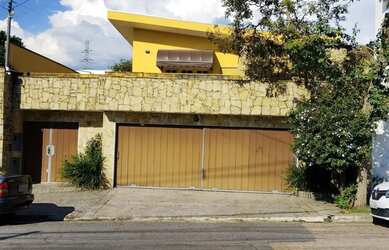 Imagem: A casa possui 3 Dormitórios, 4 Banheiros, 4 Vagas na garagem