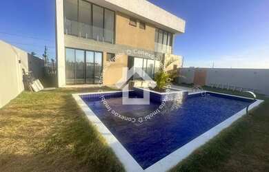 Imagem: A casa em condomínio possui 4 Dormitórios, 4 Banheiros, 2