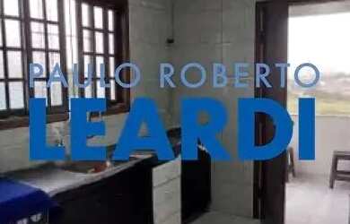 Imagem: A casa possui 3 Dormitórios, 3 Banheiros, 2 Vagas na garagem