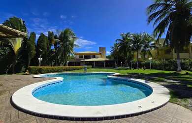 Imagem: A casa em condomínio possui 5 Dormitórios, 5 Banheiros, 4