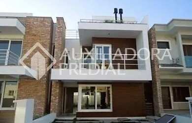 Imagem: A casa em condomínio possui 3 Dormitórios, 5 Banheiros, 2