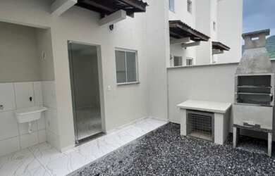 Imagem: A casa possui 2 Dormitórios, 1 Banheiro, 2 Vagas na garagem