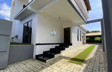 Imagem: A casa possui 3 Dormitórios, 3 Banheiros, 5 Vagas na garagem