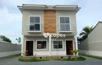 Imagem: A casa possui 2 Dormitórios, 3 Banheiros, 1 Vaga na garagem