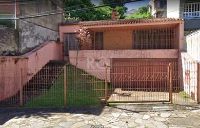 Imagem: A casa possui 3 Dormitórios, 4 Banheiros, 5 Vagas na garagem