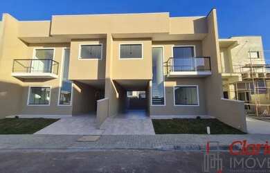 Imagem: A casa em condomínio possui 3 Dormitórios, 2 Banheiros, 2