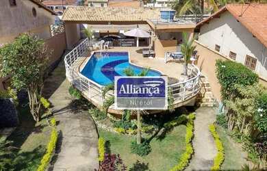 Imagem: A casa possui 4 Dormitórios, 4 Banheiros, 2 Vagas na garagem