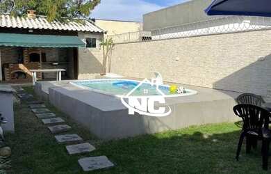 Imagem: A casa possui 2 Dormitórios, 3 Banheiros, 1 Vaga na garagem