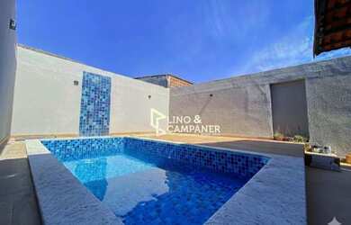 Imagem: A casa possui 2 Dormitórios, 2 Banheiros, 2 Vagas na garagem