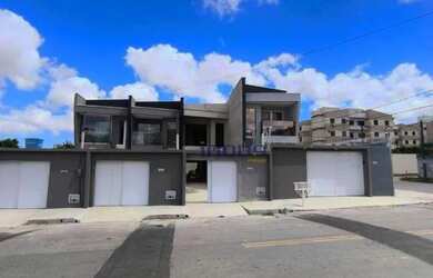 Imagem: A casa possui 3 Dormitórios, 2 Banheiros, 2 Vagas na garagem