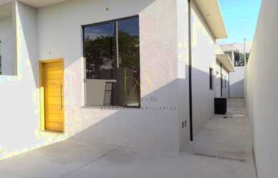 Imagem: A casa possui 3 Dormitórios, 3 Banheiros, 2 Vagas na garagem