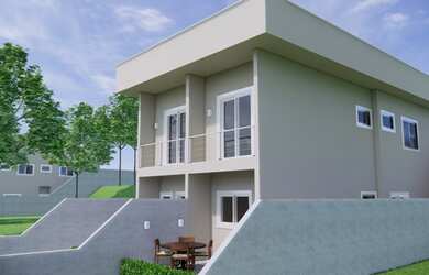 Imagem: A casa possui 2 Dormitórios, 3 Banheiros, 2 Vagas na garagem