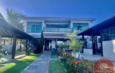 Imagem: A casa possui 4 Dormitórios, 5 Banheiros, 4 Vagas na garagem