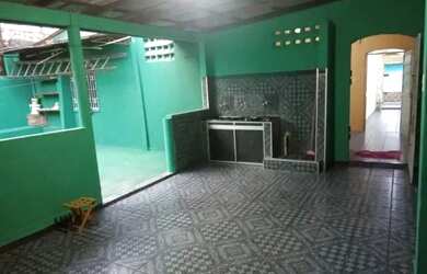 Imagem: A casa possui 3 Dormitórios, 2 Banheiros, 2 Vagas na garagem