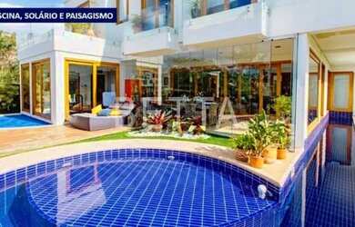 Imagem: A casa em condomínio possui 5 Dormitórios, 5 Banheiros, 2