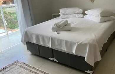 Imagem: A casa possui 2 Dormitórios, 1 Vaga na garagem e está localizado