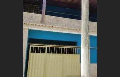 Imagem: A casa possui 3 Dormitórios, 1 Banheiro, 1 Vaga na garagem