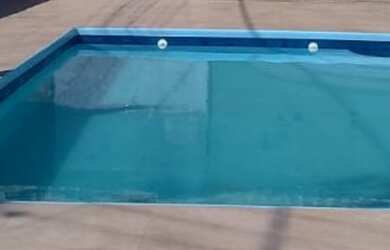 Imagem: A casa possui 3 Dormitórios, 2 Banheiros, 2 Vagas na garagem