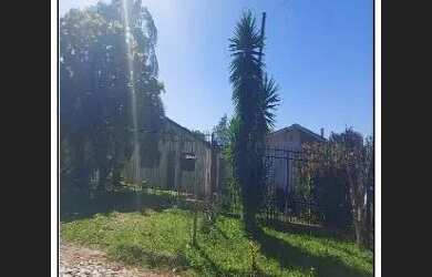 Imagem: A casa possui 2 Dormitórios, 1 Banheiro, 1 Vaga na garagem