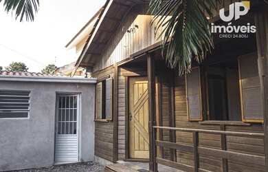 Imagem: A casa possui 2 Dormitórios, 1 Banheiro, 2 Vagas na garagem