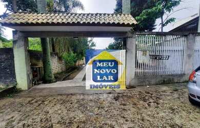 Imagem: A casa possui 3 Dormitórios, 2 Banheiros, 1 Vaga na garagem