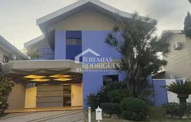 Imagem: A casa em condomínio possui 4 Dormitórios, 5 Banheiros, 4