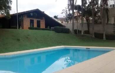 Imagem: A casa possui 3 Dormitórios, 4 Banheiros, 4 Vagas na garagem