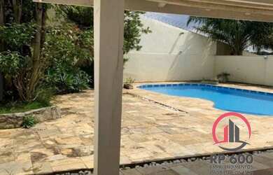 Imagem: A casa em condomínio possui 4 Dormitórios, 5 Banheiros, 4