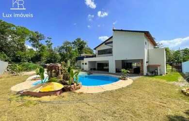 Imagem: A casa em condomínio possui 4 Dormitórios, 5 Banheiros, 4