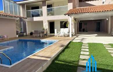 Imagem: A casa possui 5 Dormitórios, 3 Banheiros, 5 Vagas na garagem