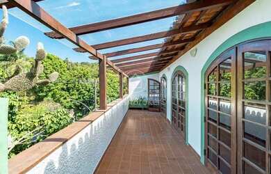 Imagem: A casa em condomínio possui 4 Dormitórios, 5 Banheiros, 4