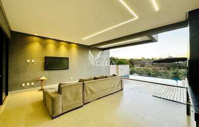 Imagem: A casa possui 3 Dormitórios, 4 Banheiros, 3 Vagas na garagem