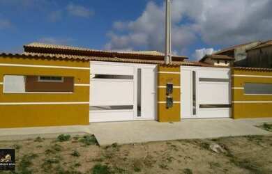 Imagem: A casa possui 2 Dormitórios, 2 Banheiros, 3 Vagas na garagem