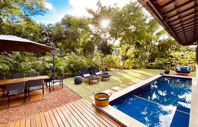 Imagem: A casa possui 5 Dormitórios, 5 Banheiros, 5 Vagas na garagem