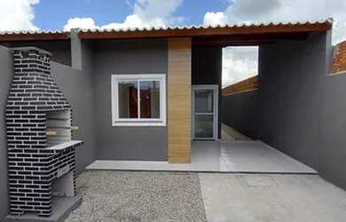 Imagem: A casa possui 3 Dormitórios, 2 Banheiros, 2 Vagas na garagem